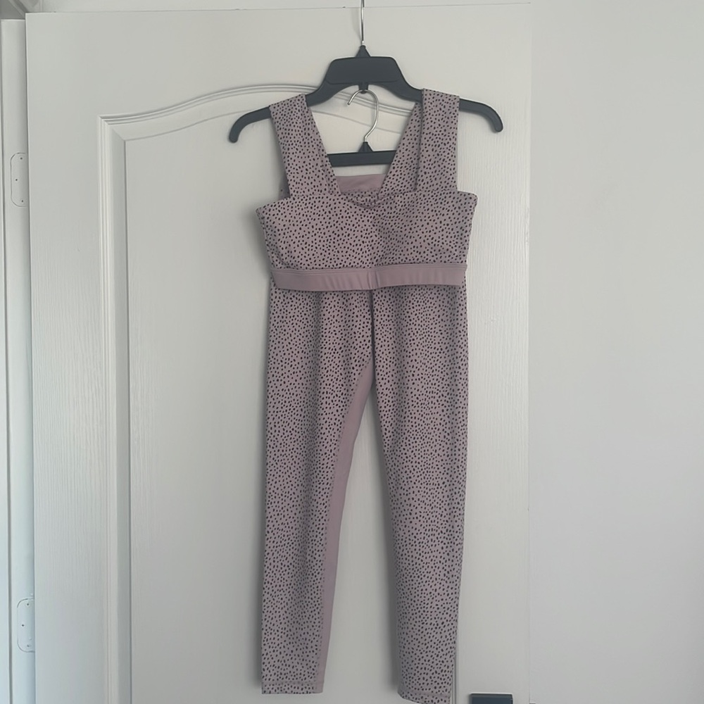Size SMALL pink with black polka dots workout set. 73% polyester, 27% spandex.